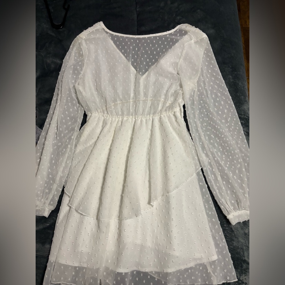 Medium white dress top is see through